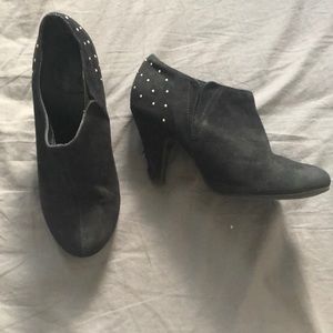 Black heals with gold studs